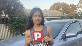 Ashvita with her Red P Plates after passing her driving test