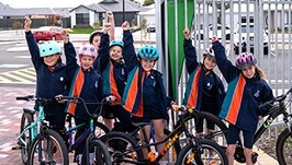 Children celebrating with bikes