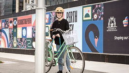 Young woman with her bike