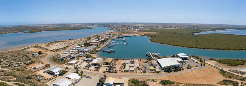 Drone image of Carnarvon Boat Harbour and surrounding buildings.