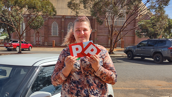 Amy smiling with her new P plates