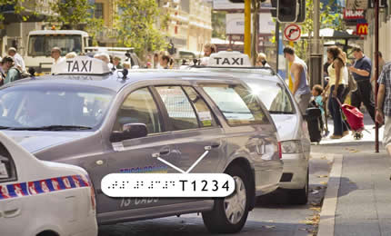 Image of taxi ID plate