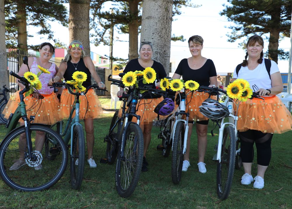 City of Geraldton Women on Wheels Event Photo Women on bike with flowers